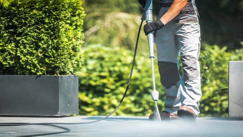 Pressure cleaning in Perth restoring a stained driveway surface